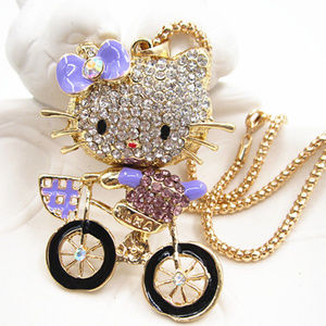 Purple Kitty riding a Bike Pendant